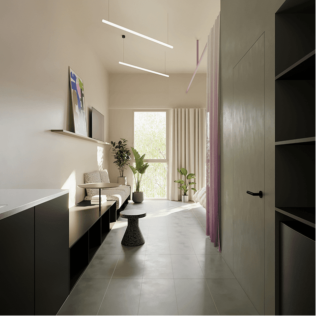 Inside a studio at WAO Certosa: fitted kitchen, small sofa and a window onto greenery