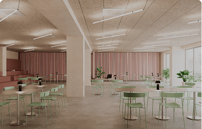 A WAO common area with tables and green seats for working or meeting people